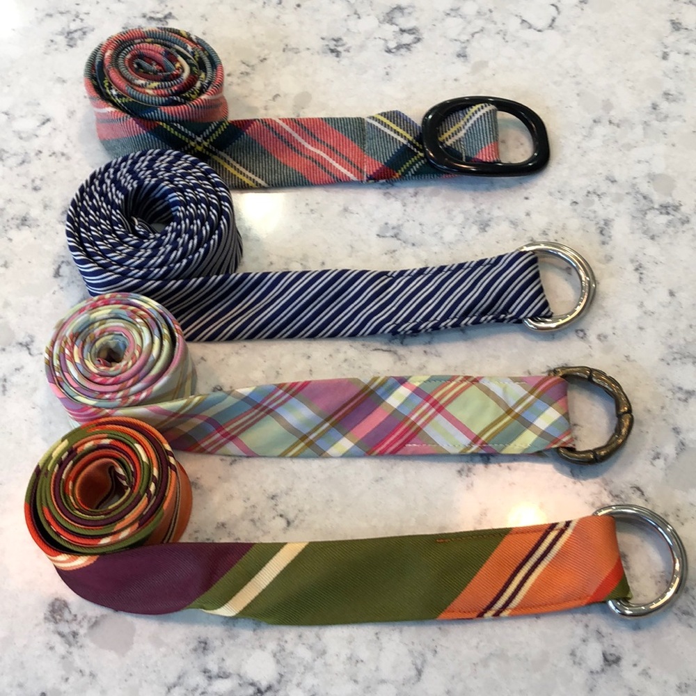 Four ladies J. Crew belts